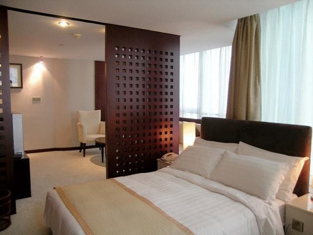 Brightel All Suites Shanghái Habitación foto
